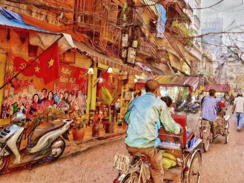 Wearing a Bamboo Hat around Hanoi,&nbsp;Vietnam